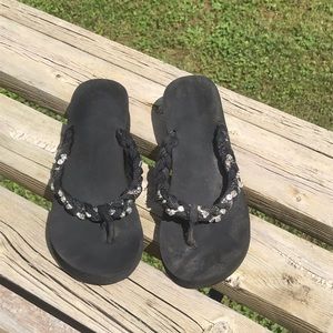 Women’s size 8 black sandals.
